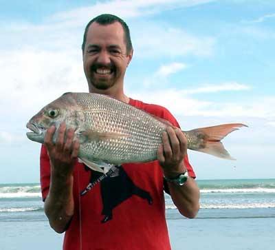 A happy kitefisher displays his biggest snapper of the day