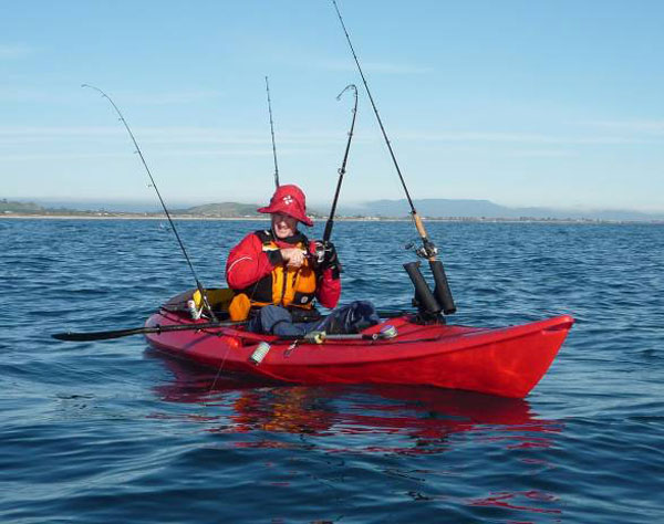 The fish towing the kayak fisherman